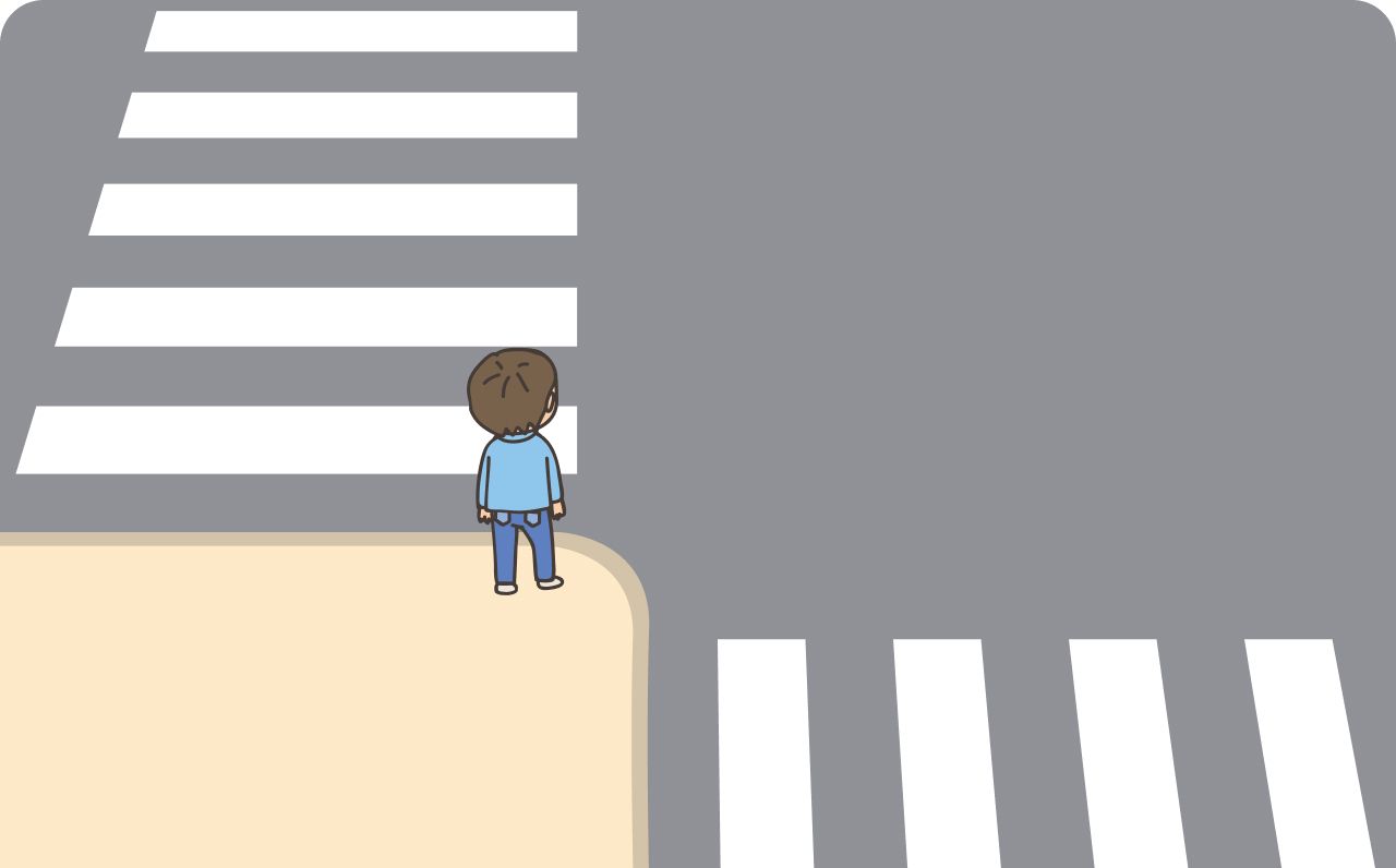 歩道の端で信号待ちをしているイラスト